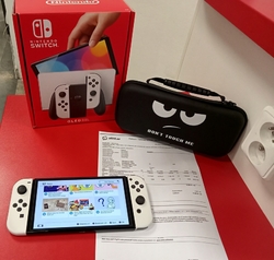 Nintendo Switch OLED záruka 12/2025 ALZA použitý